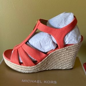 Brand new in box wedge heels by Michael Kors “Berkeley Wedge” pink grapefruit .
